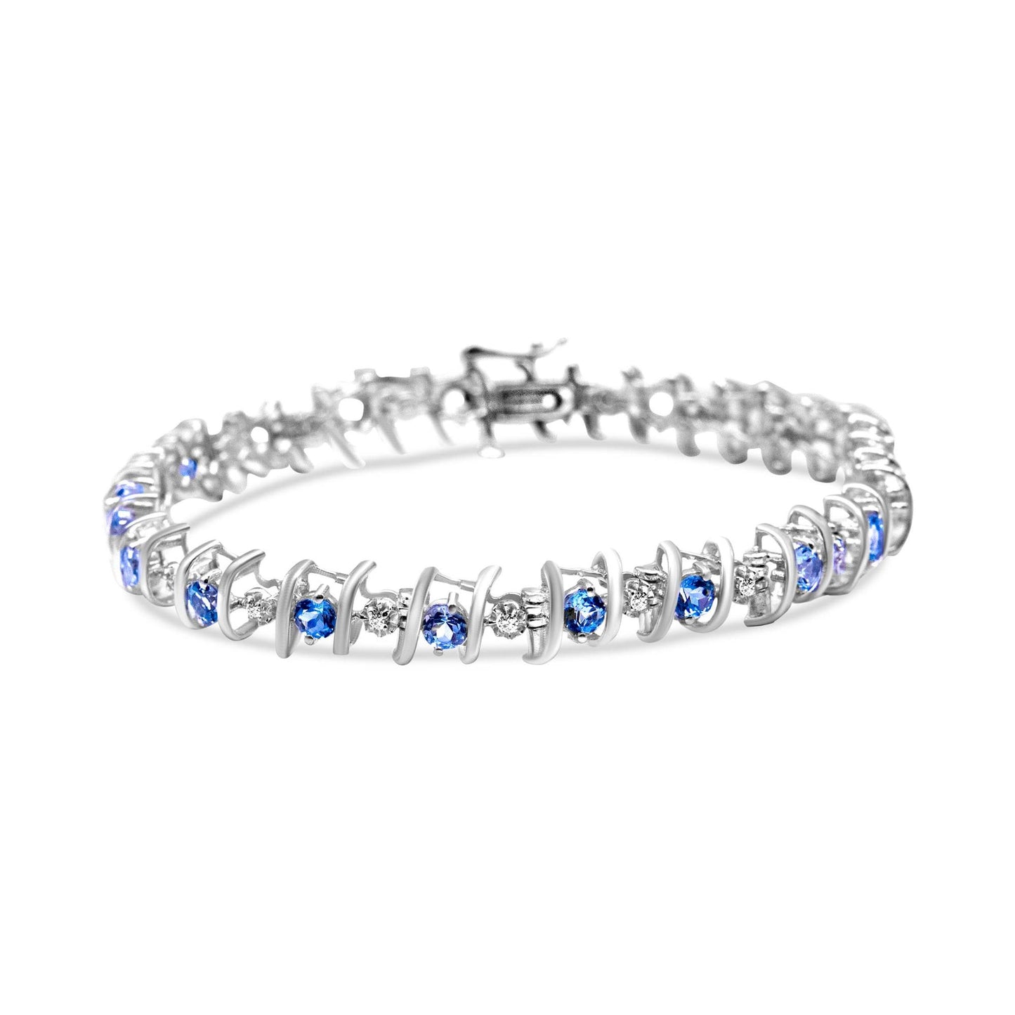 White metal bracelet with alternating round blue and white gemstones in prong settings, shown from a slightly elevated front angle.