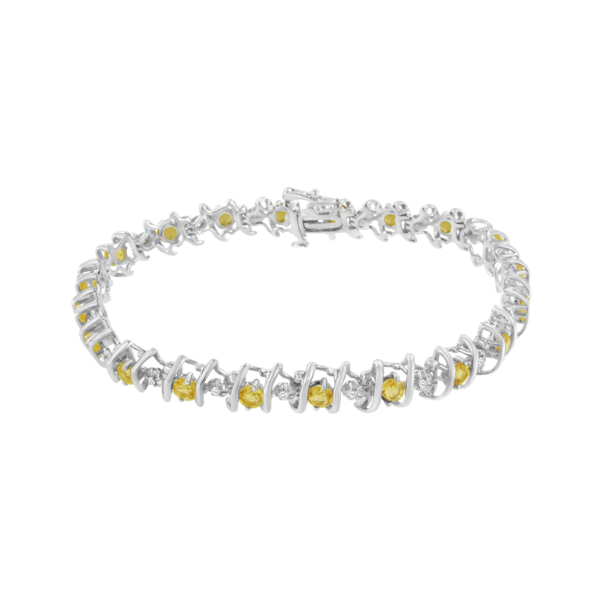 White metal bracelet with alternating round yellow gemstones and white gemstones in prong and miracle settings, shown from a slightly elevated front angle.