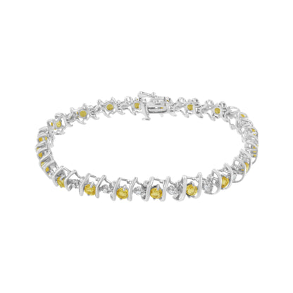 White metal bracelet with alternating round yellow gemstones and white gemstones in prong and miracle settings, shown from a slightly elevated front angle.