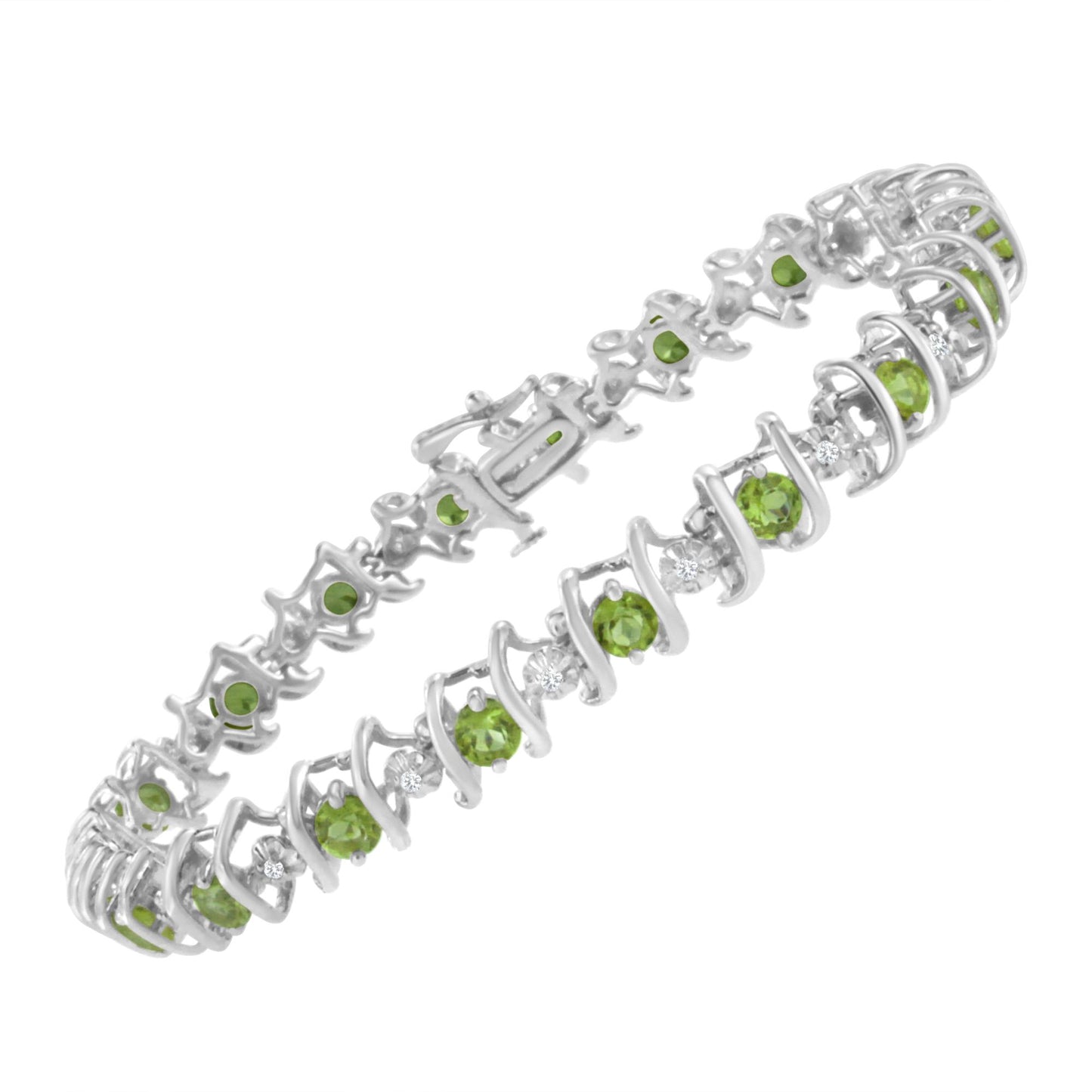 White metal bracelet with alternating round green gemstones in prong settings and round white gemstones in miracle settings, shown from a slightly elevated angle.