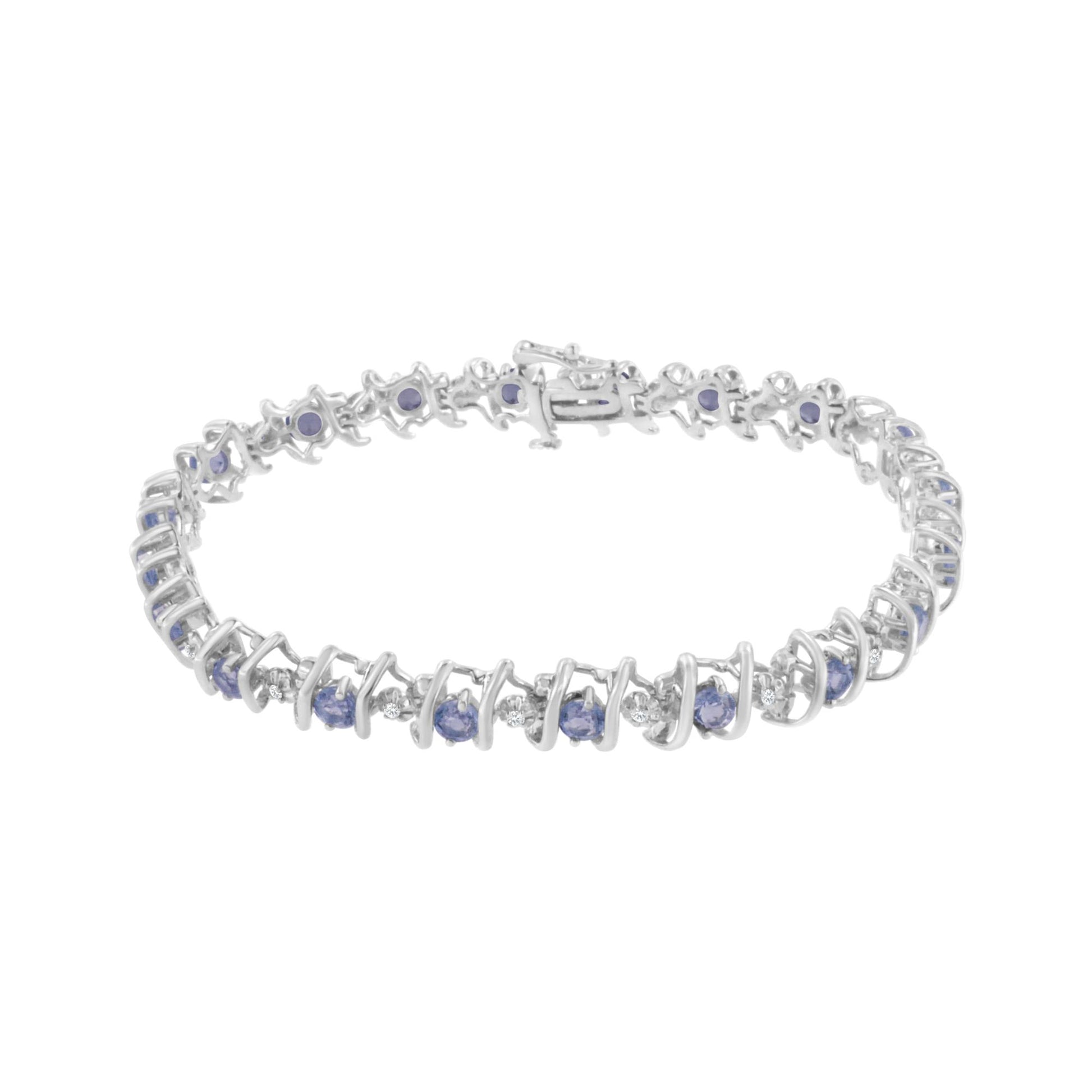 White metal bracelet with alternating round blue and white gemstones, shown from a front angle.