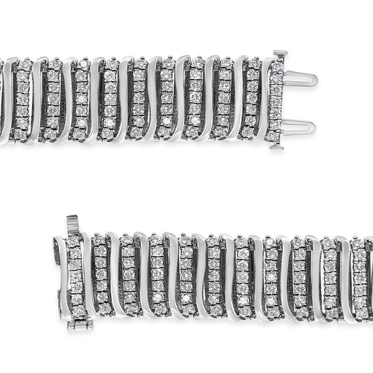 Close-up top view of a white metal bracelet with rows of round white gemstones in prong settings, showing the clasp details.