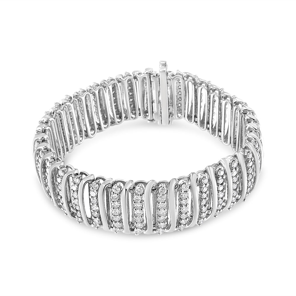 White metal bracelet with rows of round white gemstones in prong settings, shown in a front angle on a white background.