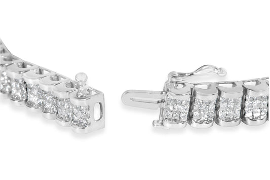 Close-up angled view of a white bracelet with multiple clusters of small princess-shaped white gemstones in an invisible setting, showing the clasp mechanism.