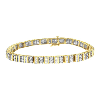 Yellow metal bracelet with alternating segments of round prong-set white gemstones and baguette channel-set white gemstones, shown in a front angle view.