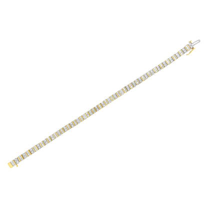 Yellow bracelet with alternating sections of round white gemstones in prong settings and baguette white gemstones in channel settings, shown flat at a slight angle.