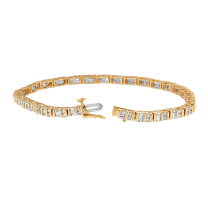 Yellow bracelet with alternating white round and baguette gemstones in channel setting, shown from a slightly angled top view with clasp open.
