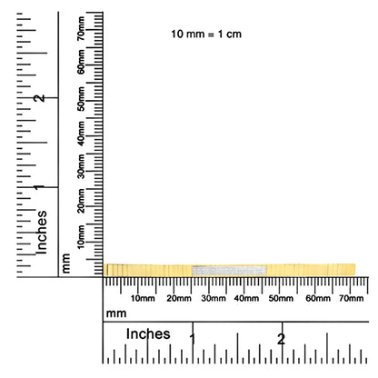 Side view of a yellow metal bracelet with a cluster of white gemstones in an invisible setting, placed on a ruler for size reference.