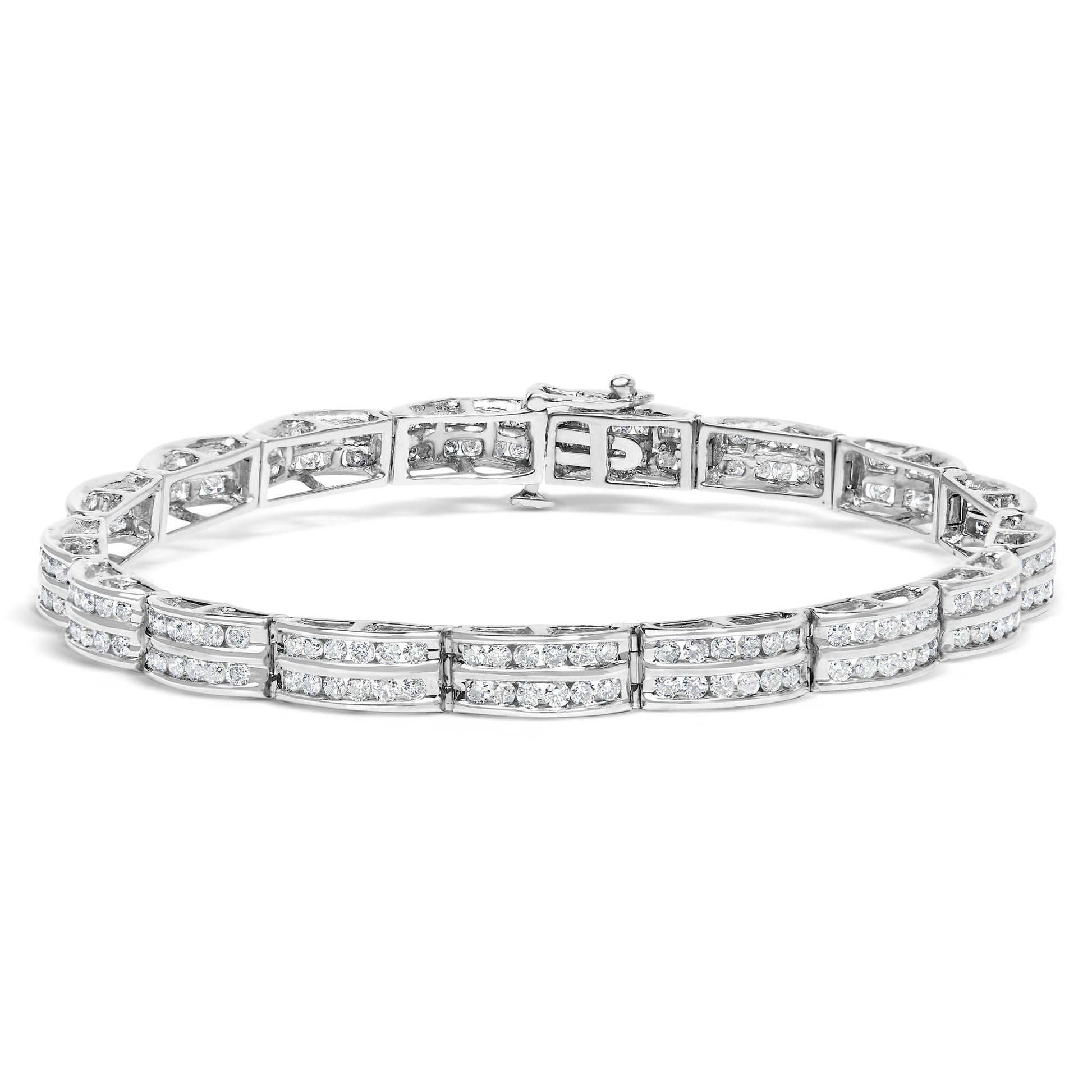 White metal bracelet with rows of round white gemstones in a channel setting, shown from a front angle.