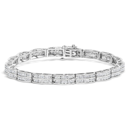 White metal bracelet with rows of round white gemstones in a channel setting, shown from a front angle.