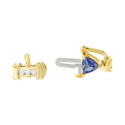 Close-up front and side view of a yellow bracelet clasp featuring white round gemstones in a channel setting and a blue trillion-shaped gemstone in a prong setting.