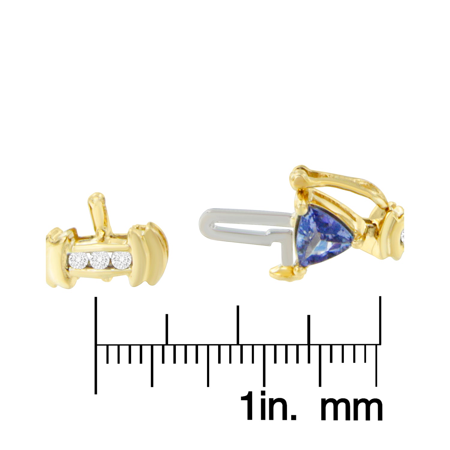 Close-up front and side view of yellow metal bracelet clasp with round white gemstones in channel setting and a blue triangular gemstone in prong setting, shown on a ruler for size reference.