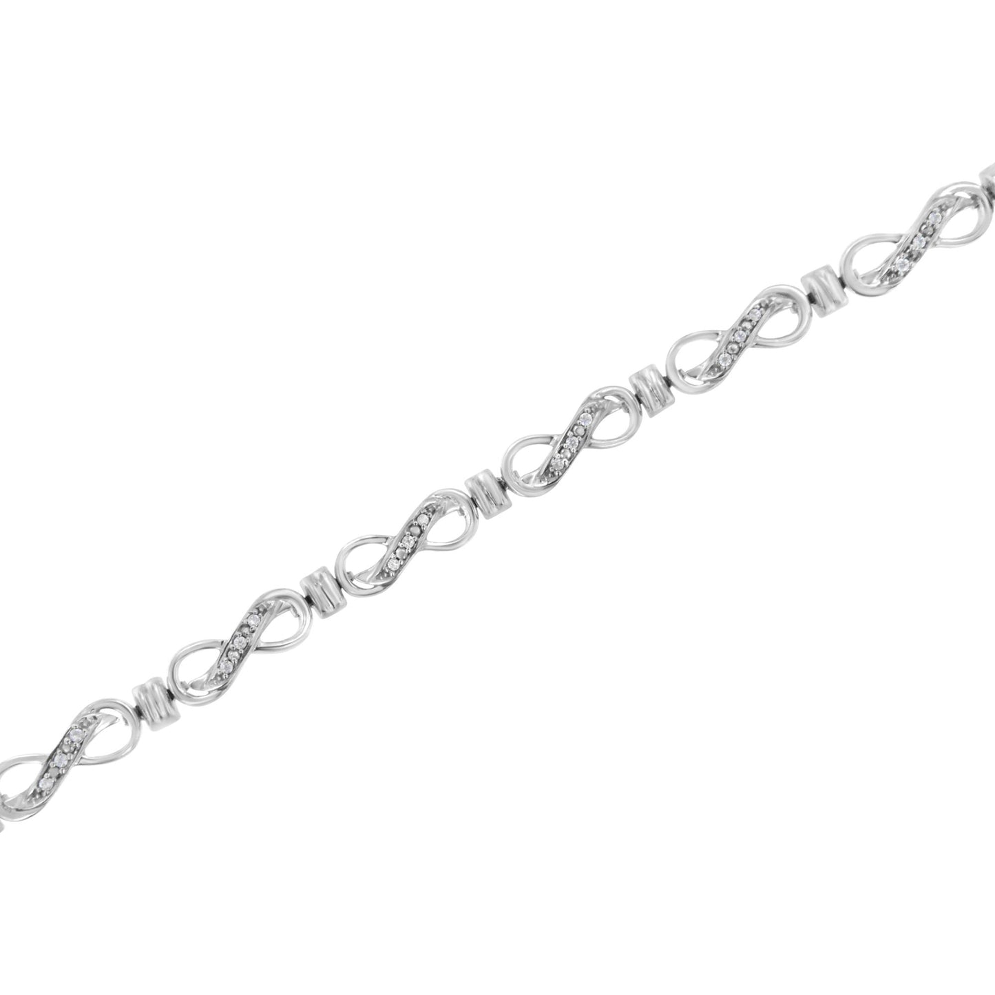 Diagonal close-up of a white metal bracelet featuring alternating infinity-shaped links with prong-set round white gemstones.
