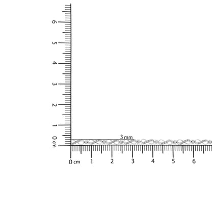 Bracelet with white metal and round white gemstones in prong setting, shown on ruler for size reference, top-down angle.