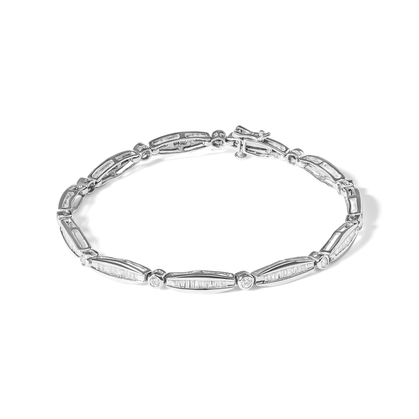 White metal bracelet with alternating round bezel-set white gemstones and elongated segments with channel-set baguette white gemstones, shown from a top angle.