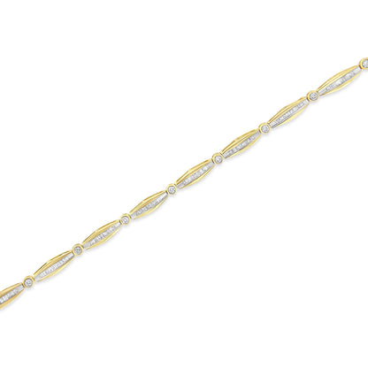 Diagonal flat lay of a yellow bracelet with alternating round bezel-set white gemstones and elongated sections of channel-set baguette white gemstones.