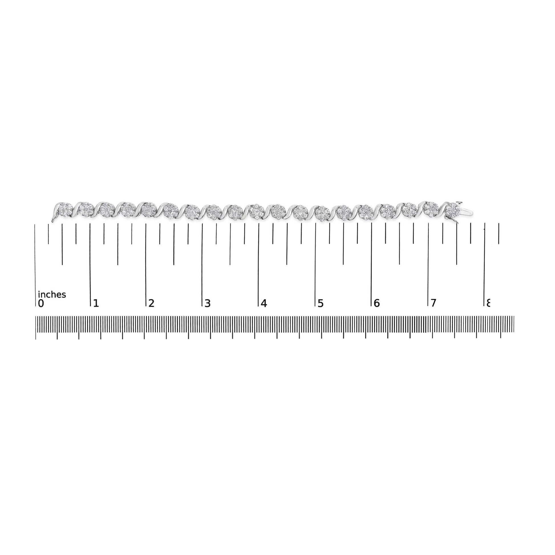 White metal bracelet with round white gemstones in prong settings, shown from top view on a ruler for size reference.