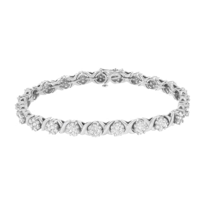 White metal bracelet with round prong-set white gemstones, shown in a front close-up view.