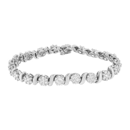 White metal bracelet with round white gemstones in prong settings, shown from slightly above angle.