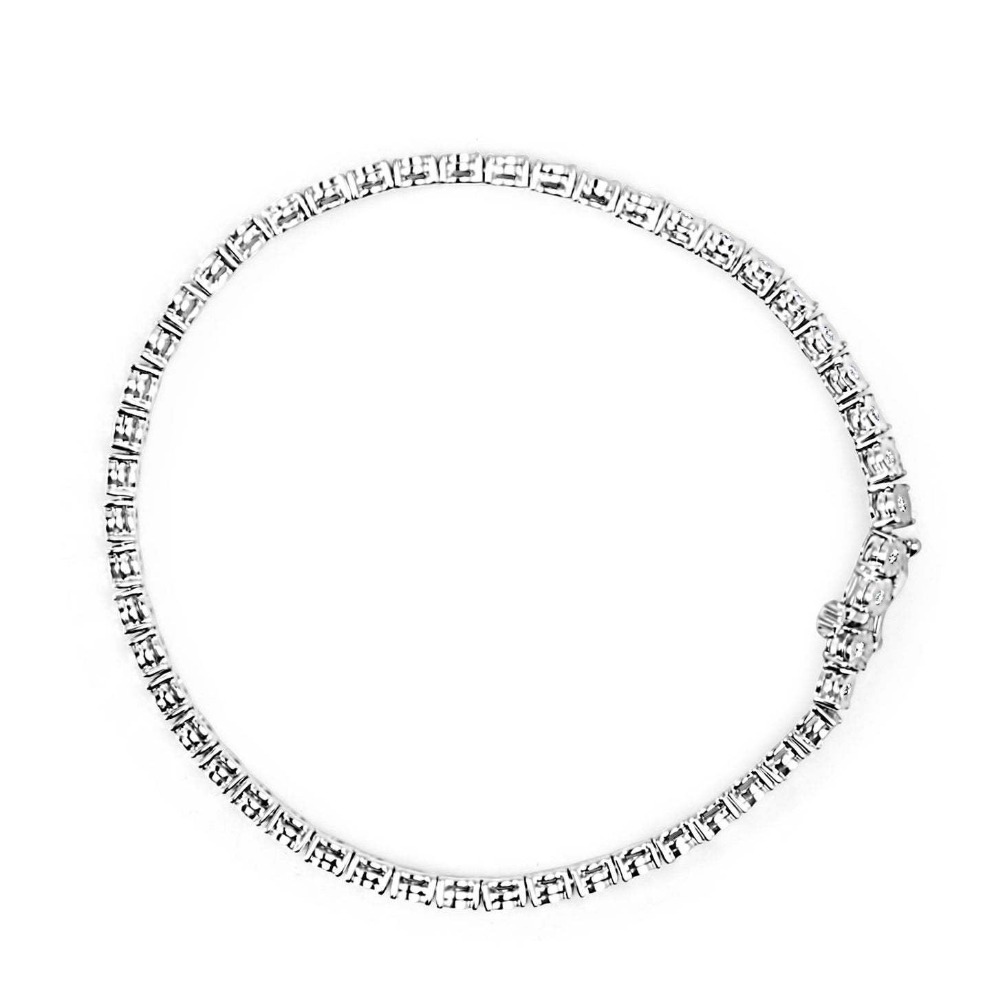 Top-down view of a white metal bracelet with round white gemstones in a miracle setting forming a continuous circle.