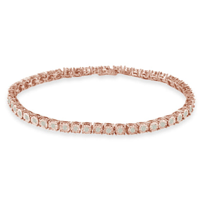 Close-up front angle view of a rose metal bracelet with round white gemstones in a miracle setting encircling it.