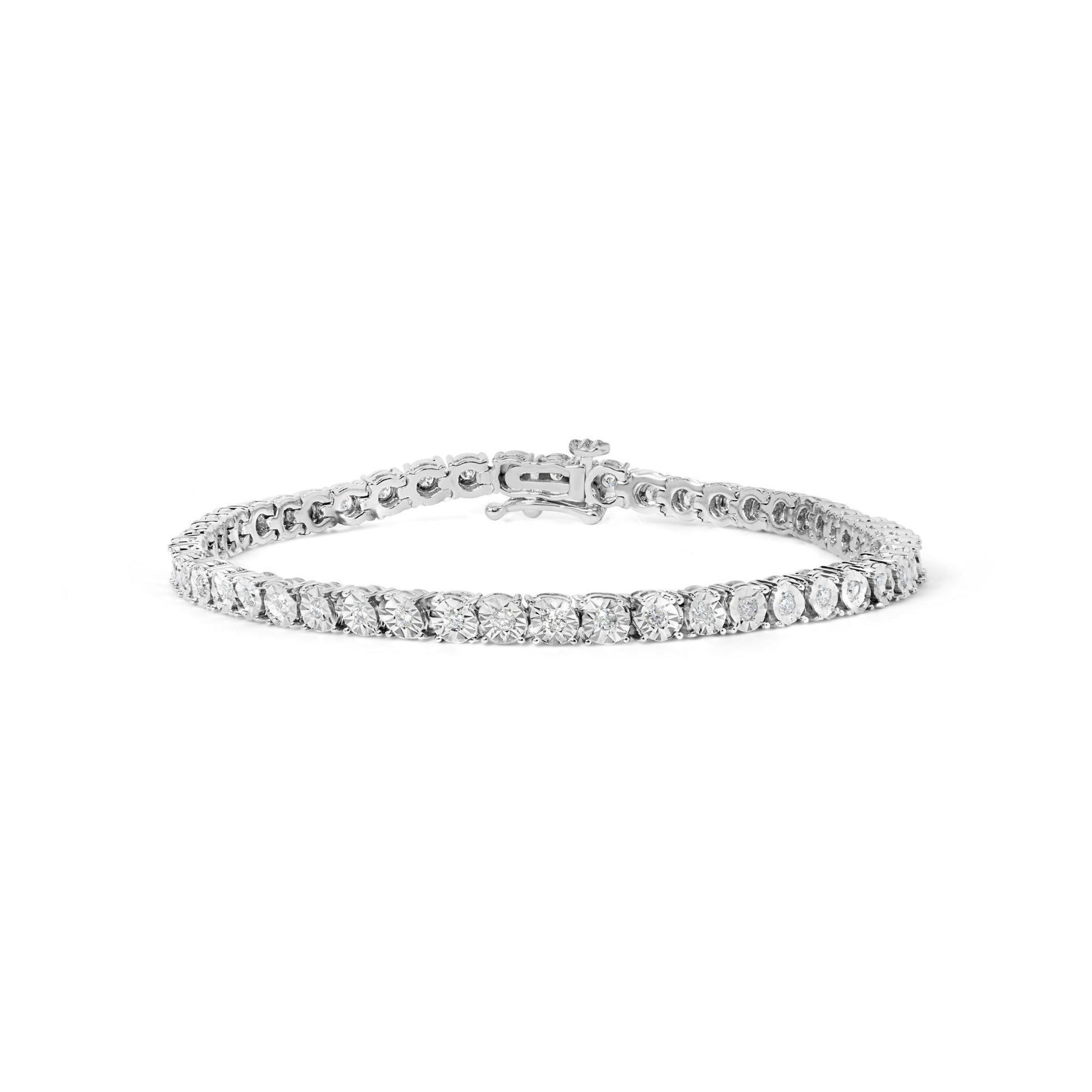 White metal bracelet with round white gemstones in a miracle setting, shown from a front angled view.