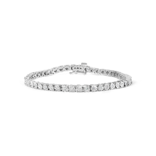White metal bracelet with round white gemstones in a miracle setting, shown from a front angled view.