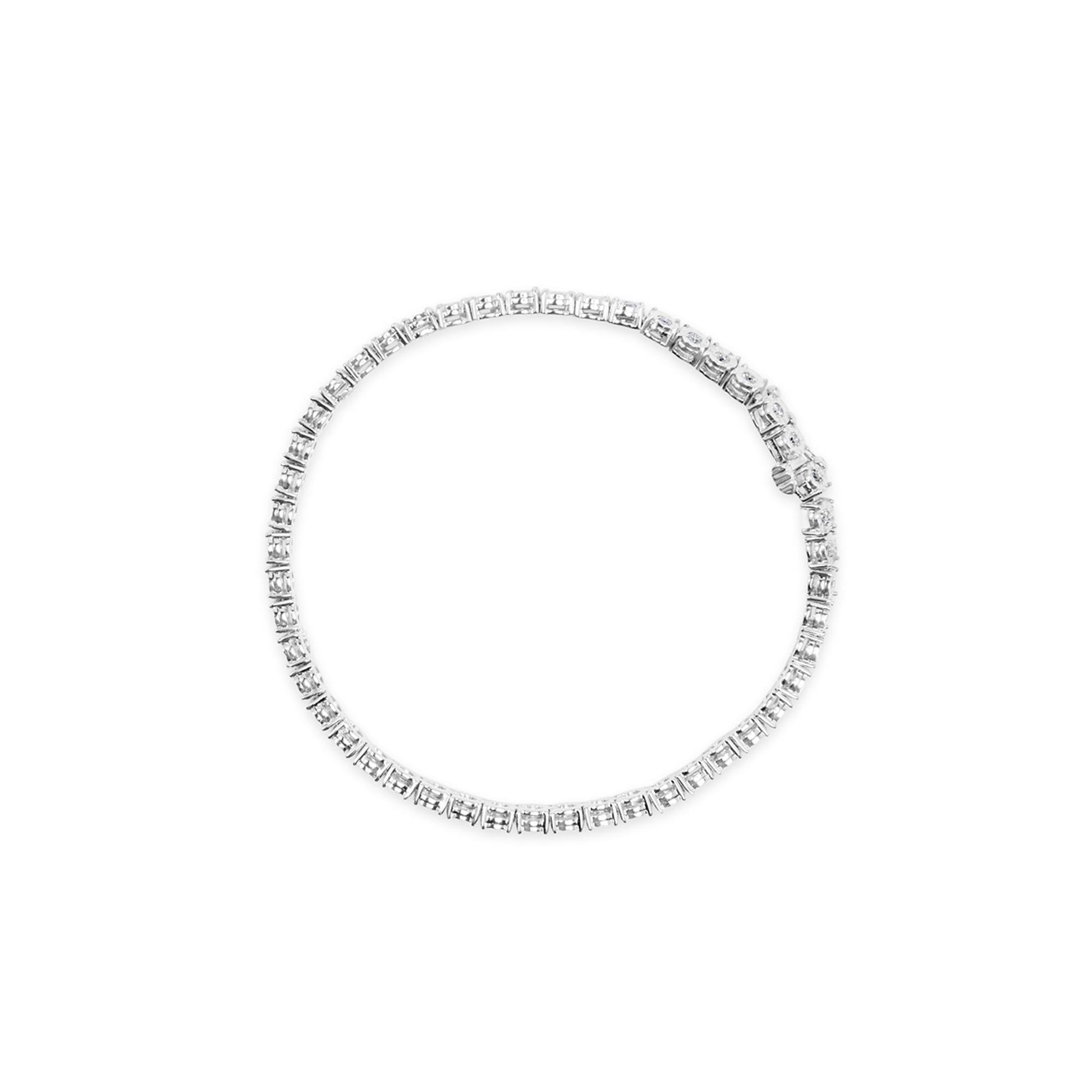 White metal bracelet with round white gemstones in miracle setting, shown from top view on a white background.