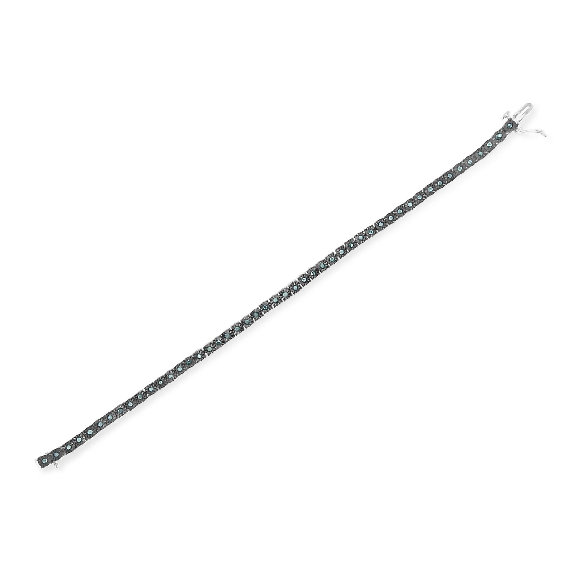 White metal bracelet with round blue gemstones in a miracle setting, shown flat from a top-down angle.