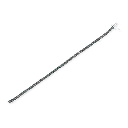 White metal bracelet with round blue gemstones in a miracle setting, shown flat from a top-down angle.