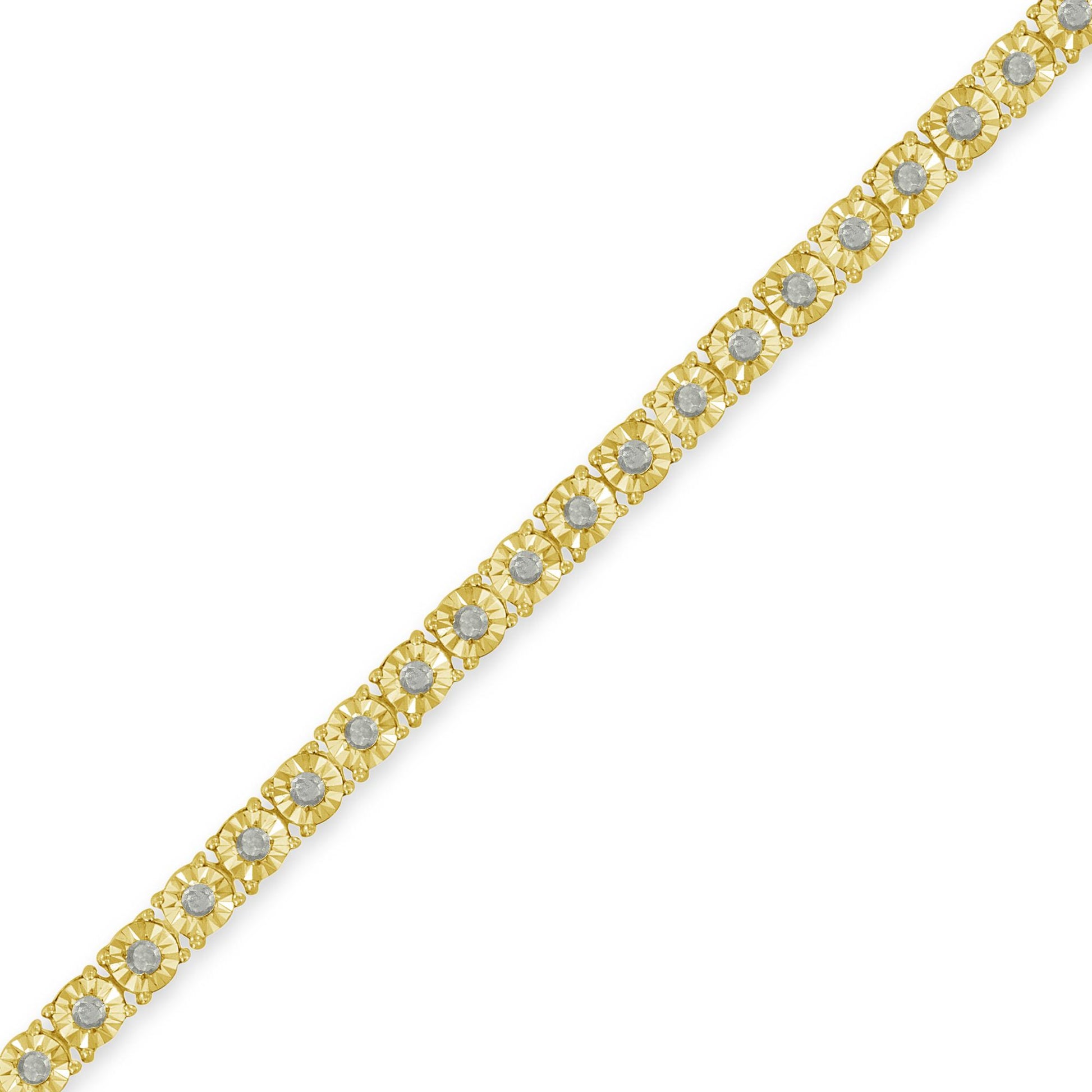 Diagonal close-up shot of a yellow bracelet with round white gemstones set in a miracle setting.