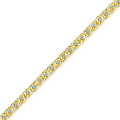 Diagonal close-up shot of a yellow bracelet with round white gemstones set in a miracle setting.