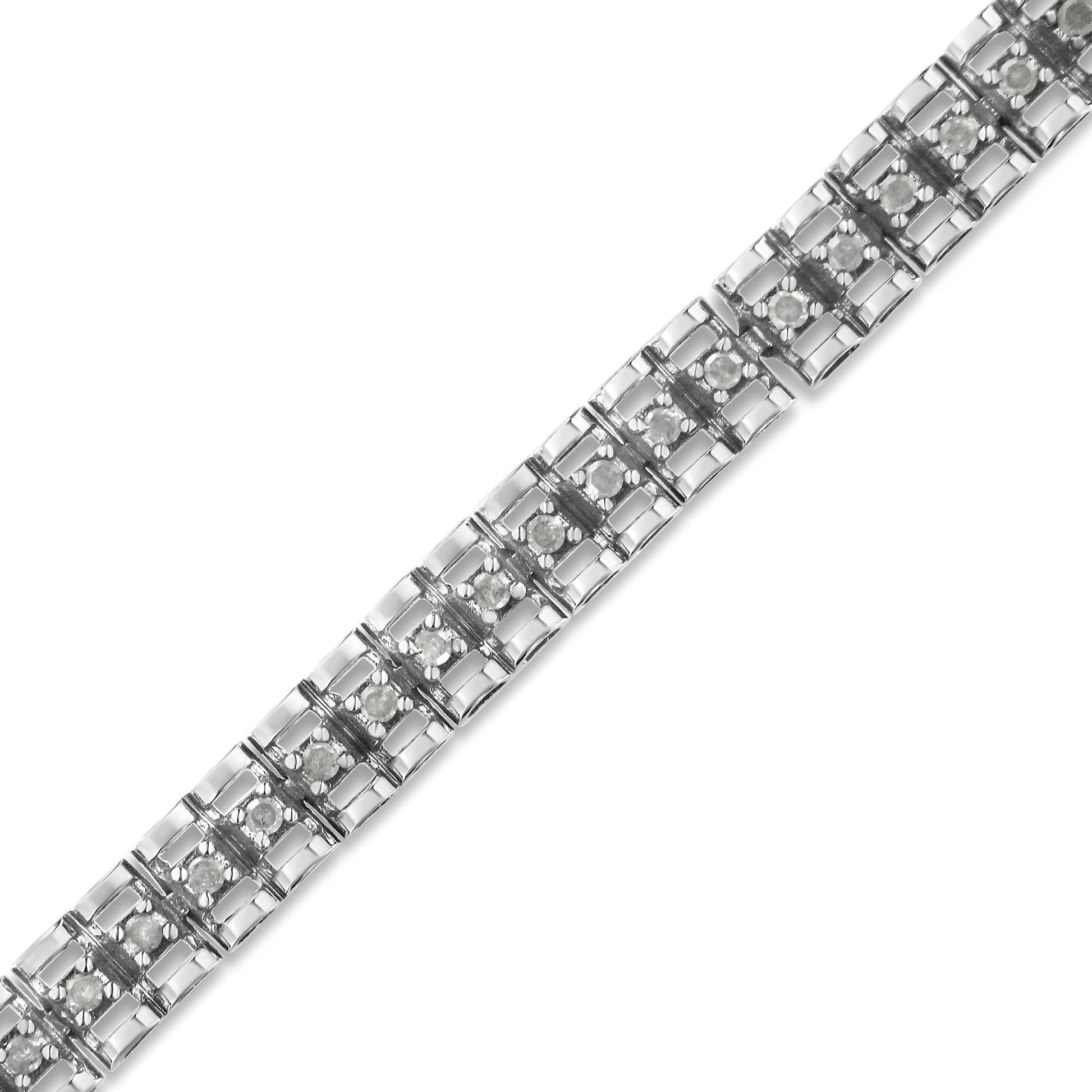 Close-up diagonal view of a white metal bracelet featuring round white gemstones in prong settings arranged in linked square sections.