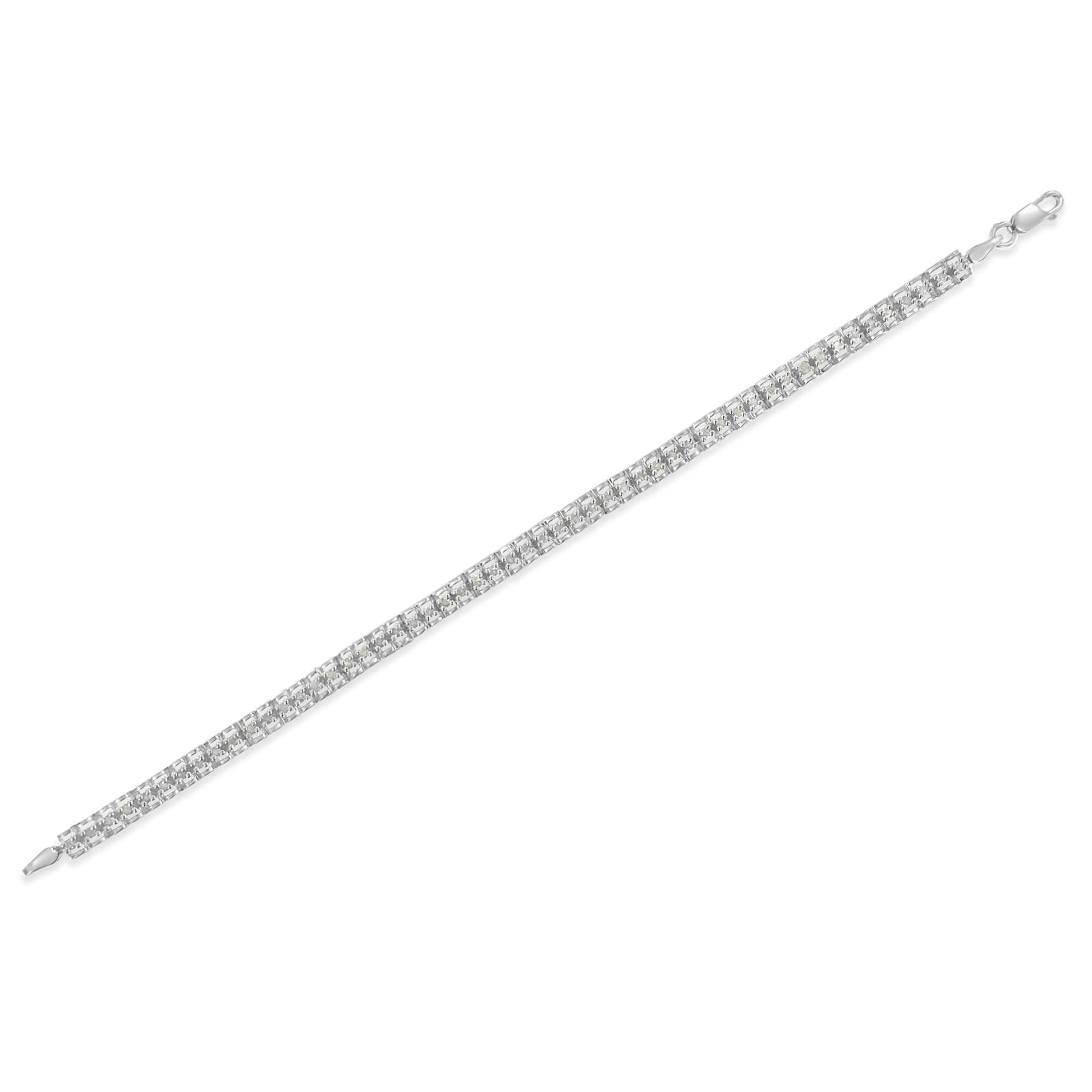 White metal bracelet with two rows of round white gemstones in prong settings, shown flat on a white background from a top-down angle.