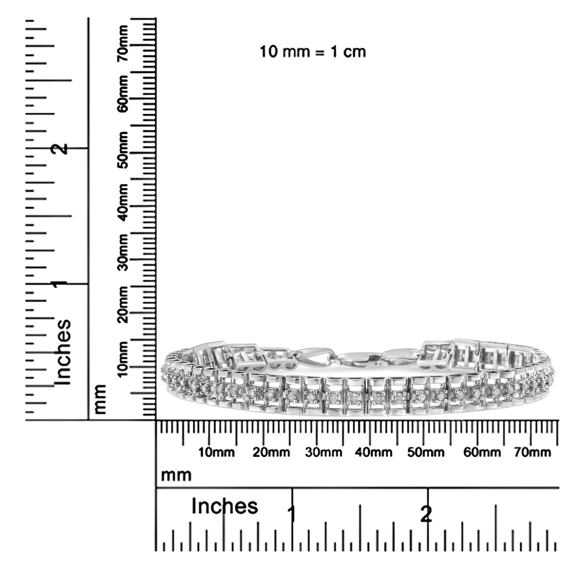 White metal bracelet with two rows of round white gemstones in prong settings, shown from front angle on a ruler for size reference.