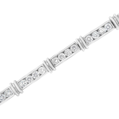 Close-up angled view of a white bracelet featuring rectangular segments with round white gemstones set in channel settings.