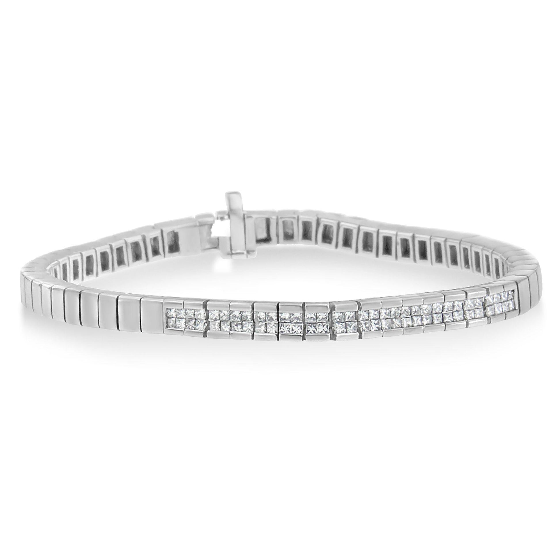 White metal bracelet with two rows of square white gemstones in invisible setting, shown in a front-facing angled view.