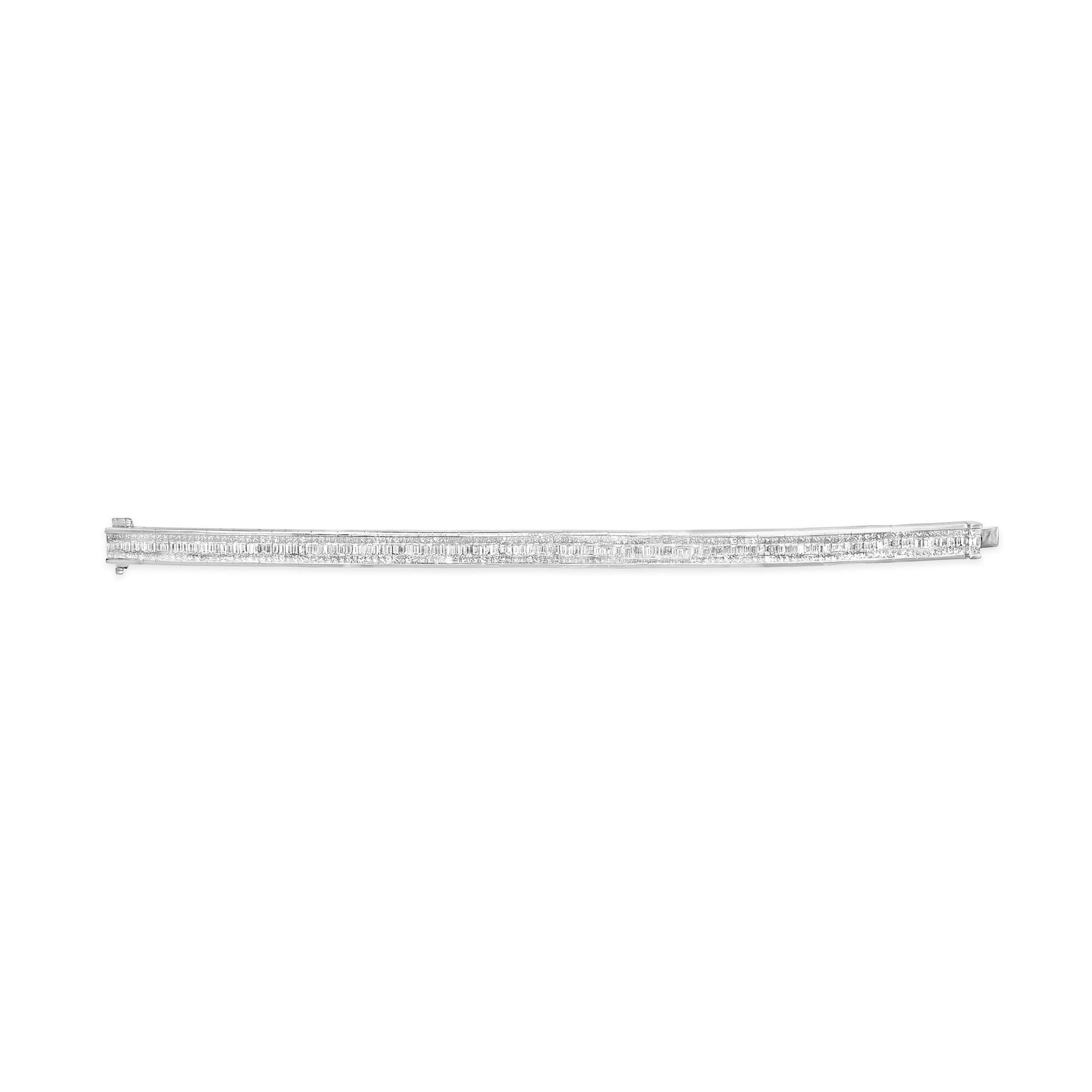 White metal bracelet with baguette and princess shaped white gemstones in channel and invisible settings, shown in a straight horizontal angle.