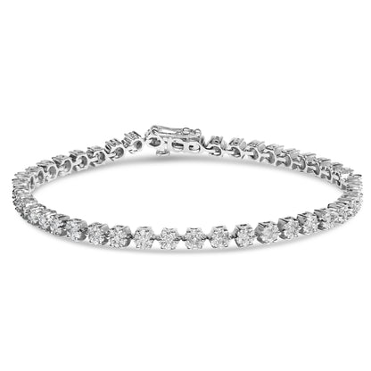 White metal tennis bracelet with round white gemstones in prong settings, shown from a slightly elevated front angle.