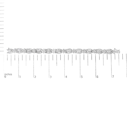 White bracelet with alternating baguette-shaped gemstones in channel setting and princess-shaped gemstones in invisible setting, displayed on a ruler scale, top-down angle.