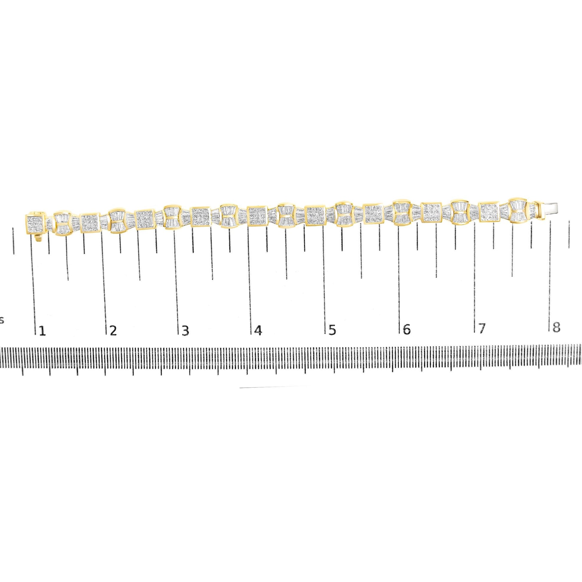 Yellow metal bracelet with alternating square and curved links set with white gemstones, shown on a scale from a top-down angle.