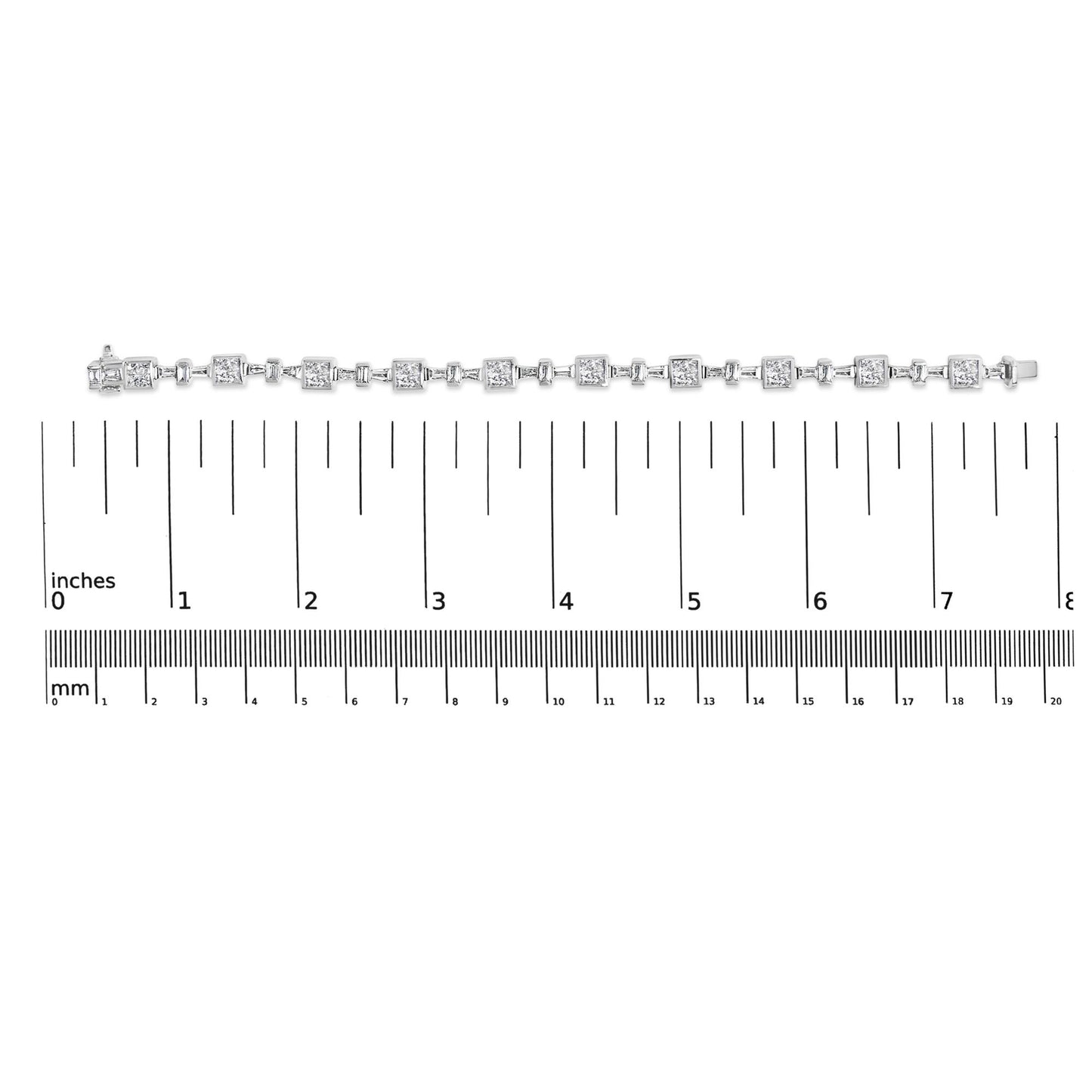 White metal bracelet with alternating princess-shaped and baguette-shaped white gemstones shown horizontally on a measurement scale, top view.