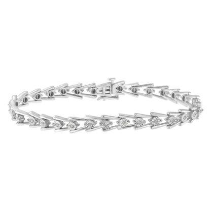 White metal bracelet with round white gemstones in a miracle setting, shown from a side angle.