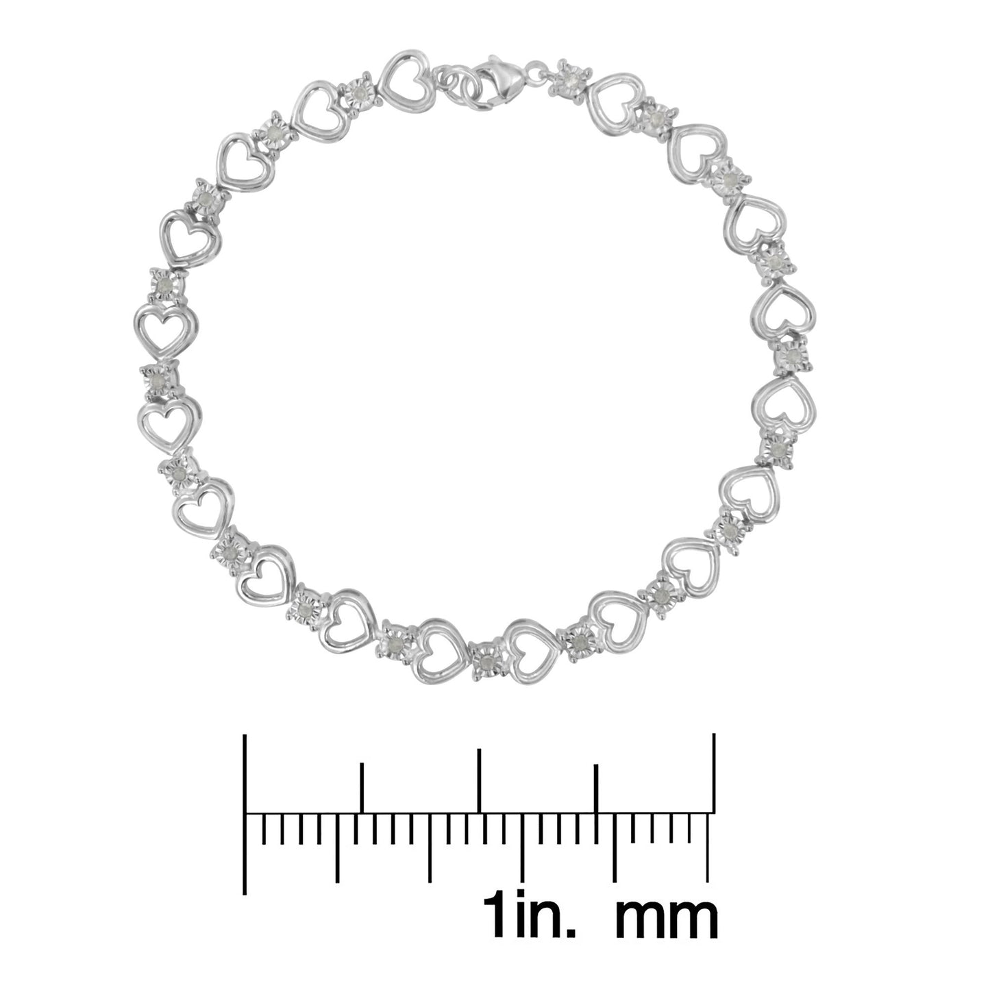 White metal bracelet with open heart links and round white gemstones in miracle settings, shown flat on a ruler for size reference, top-down view.