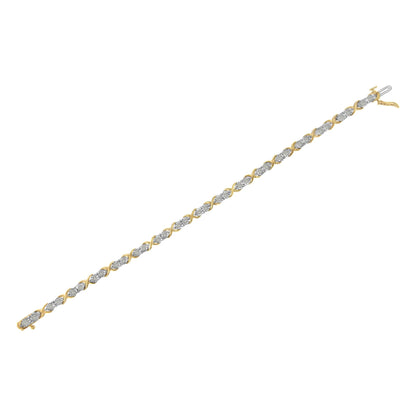 Bracelet with alternating yellow and white metal links set with round white gemstones, shown flat on a white background, angled diagonally.