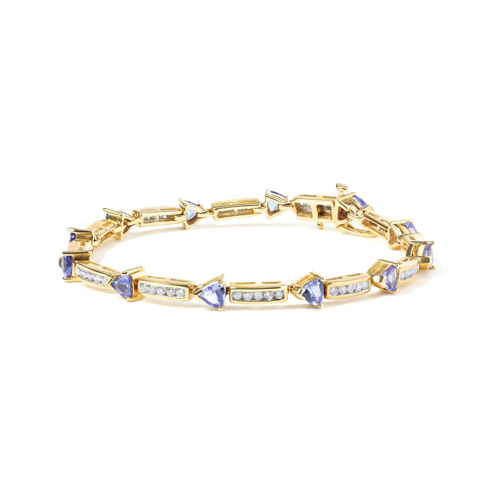 Yellow metal bracelet with alternating rectangular sections featuring white round gemstones in channel setting and blue trillion-shaped gemstones in prong setting, shown in a front angled view.