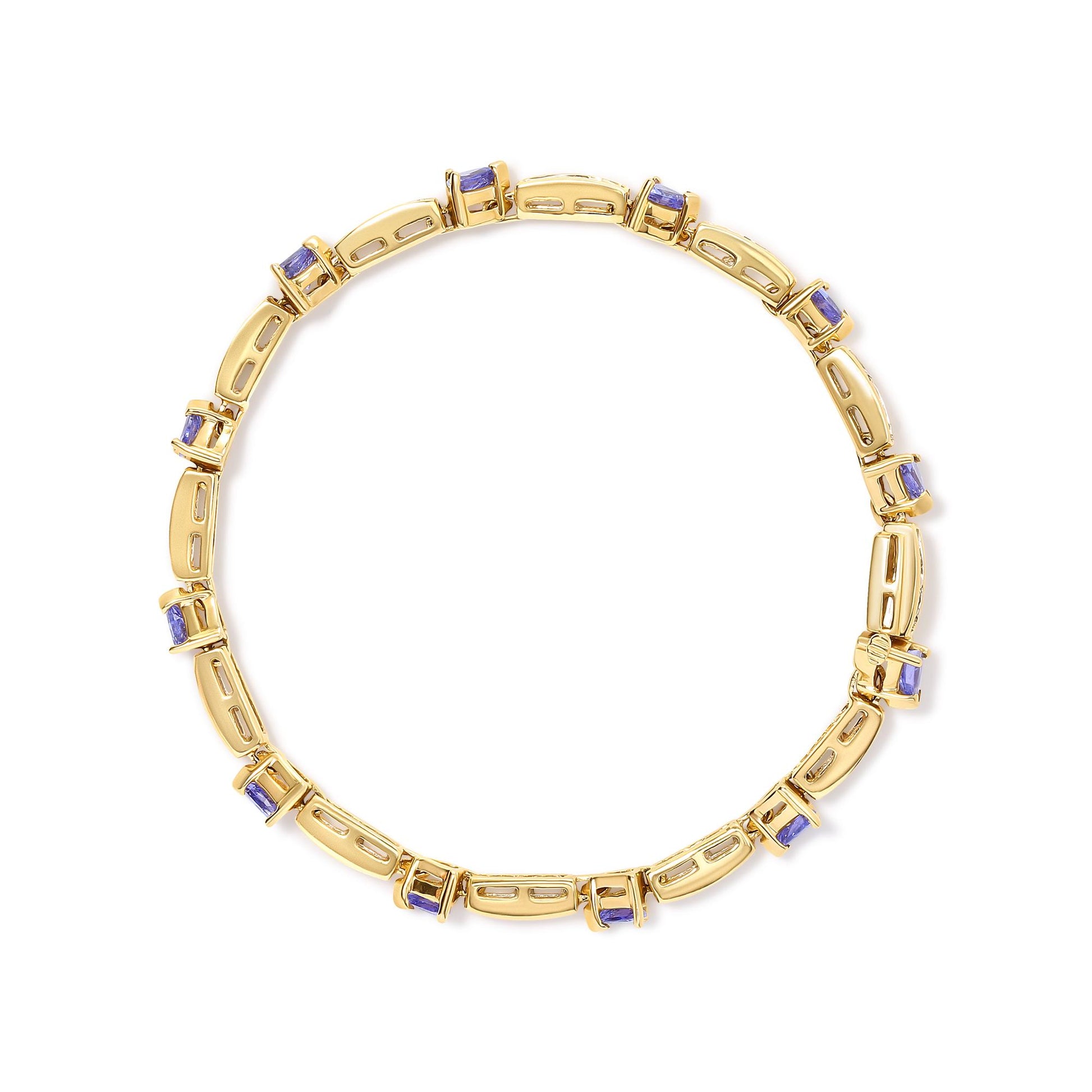Top-down view of a yellow bracelet with alternating rectangular links and blue trillion-shaped gemstones in prong settings. White round gemstones set in channels are visible on the rectangular links.