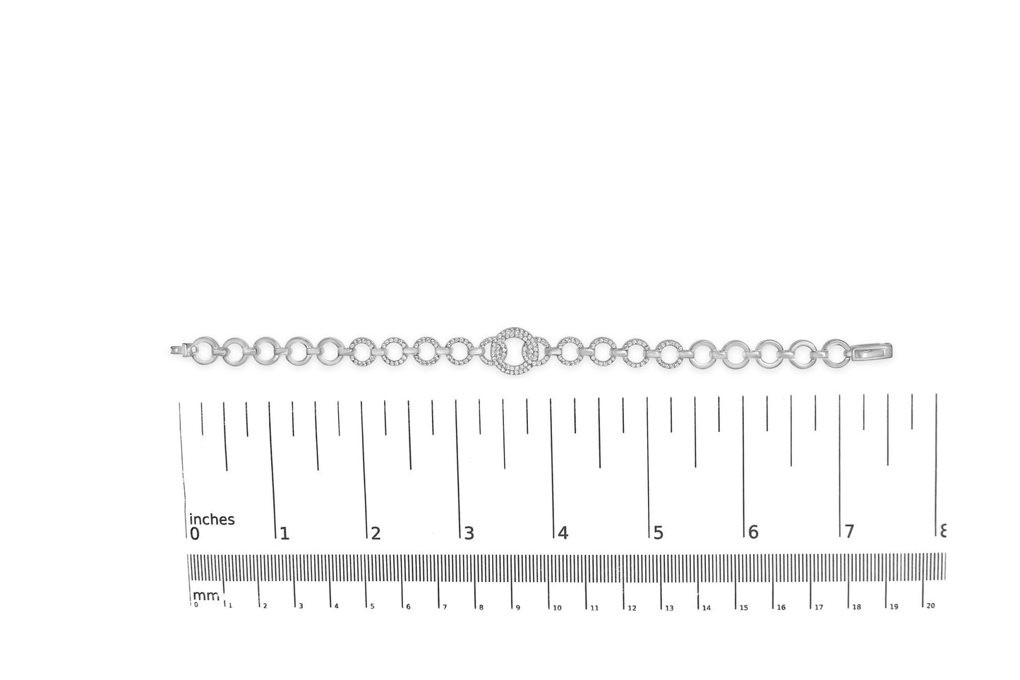 White metal bracelet with alternating plain and gemstone-set round links, shown on a scale from a top-down angle.