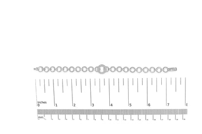 White metal bracelet with alternating plain and gemstone-set round links, shown on a scale from a top-down angle.