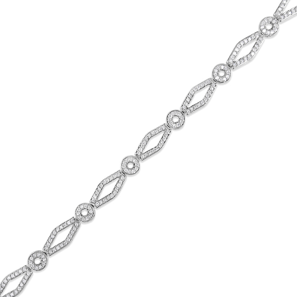 Diagonal close-up of a white metal bracelet with alternating marquise and circular links, each adorned with small white gemstones in prong settings.